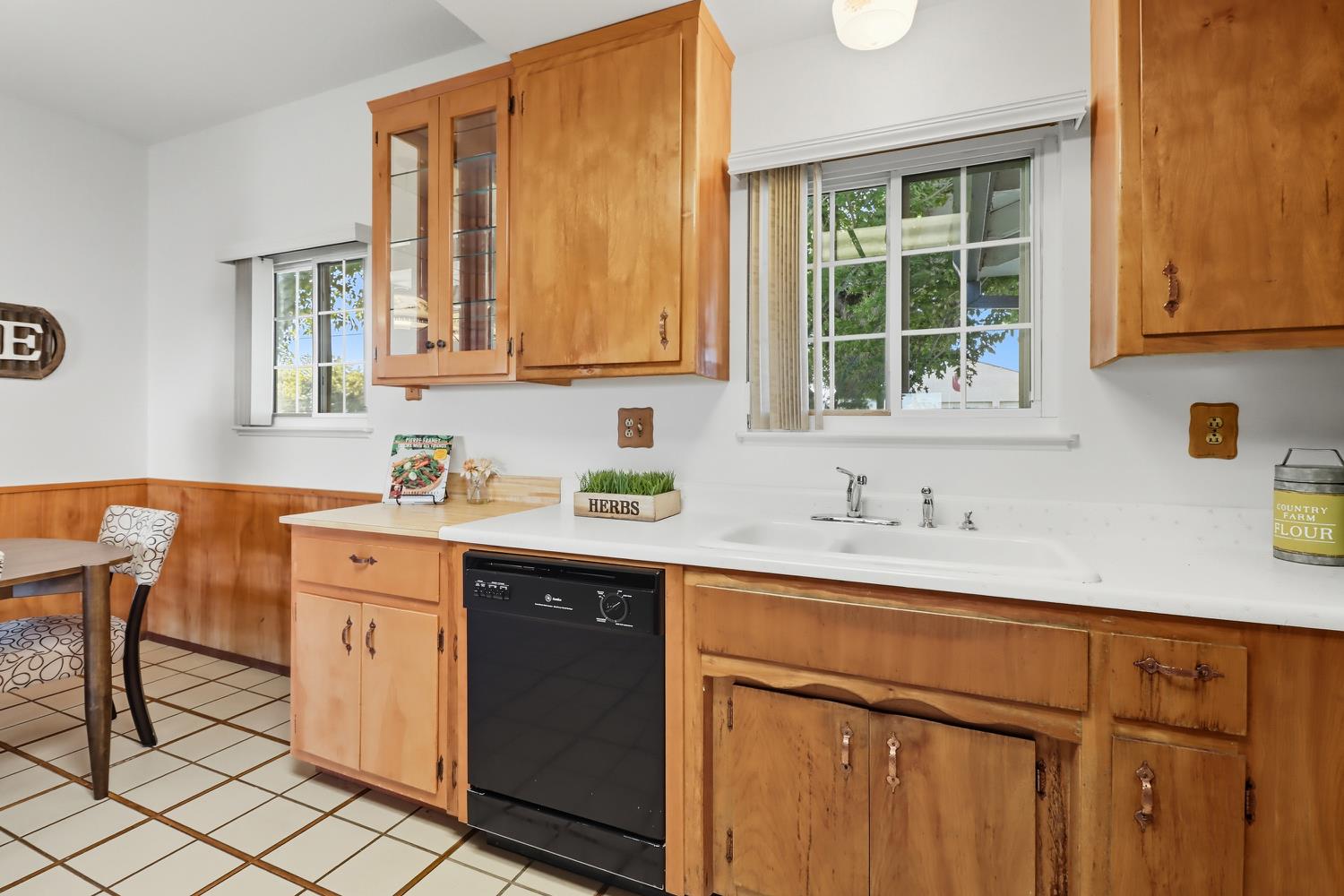 3366 Point Pleasant Road Elk Grove, CA 95757 - Photo 21 of 60 a kitchen with a sink cabinets and window