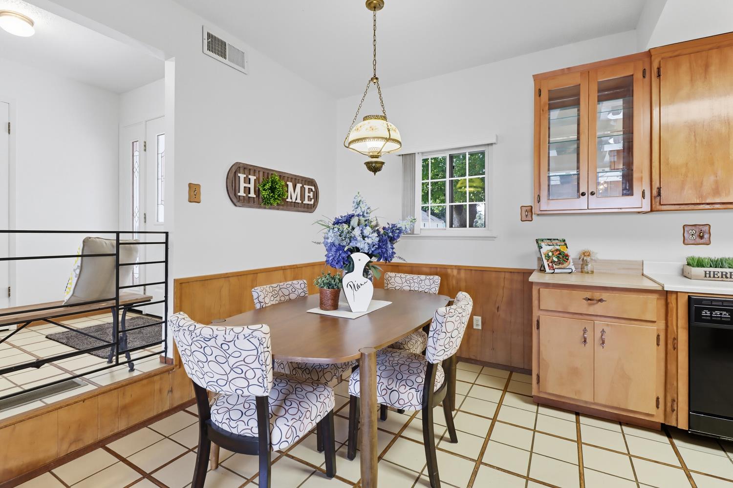 3366 Point Pleasant Road Elk Grove, CA 95757 - Photo 24 of 60 a dining room with furniture a chandelier and window