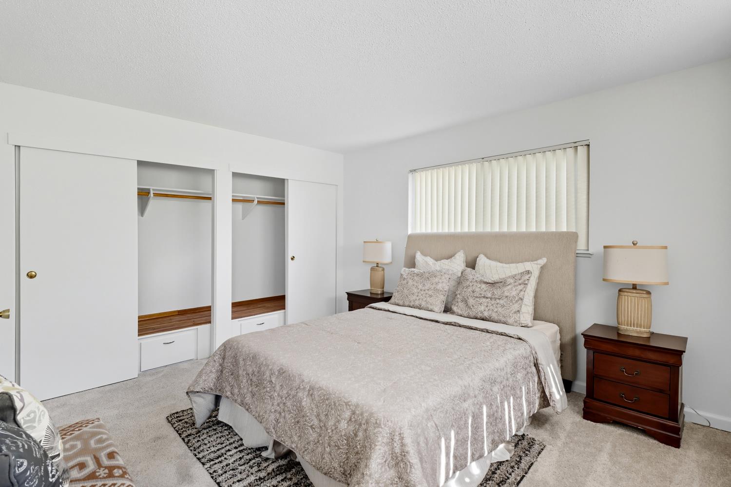 3366 Point Pleasant Road Elk Grove, CA 95757 - Photo 28 of 60 a bedroom with a bed and a lamp