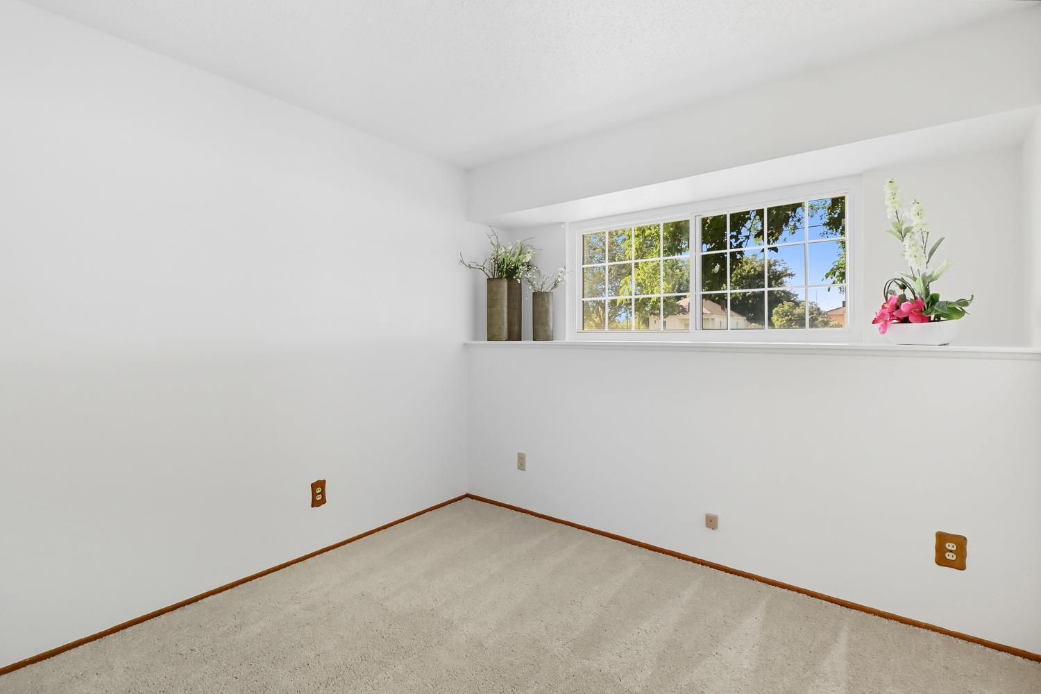 3366 Point Pleasant Road Elk Grove, CA 95757 - Photo 37 of 60 an empty room with windows