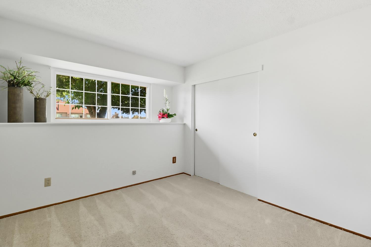 3366 Point Pleasant Road Elk Grove, CA 95757 - Photo 38 of 60 a view of an empty room with a window