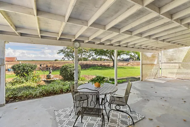 a view of a yard with an outdoor space