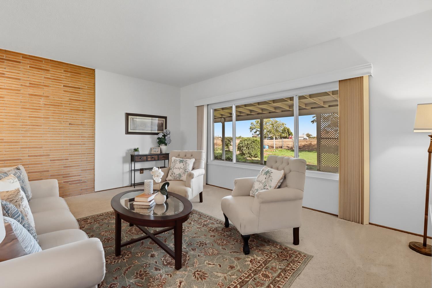 3366 Point Pleasant Road Elk Grove, CA 95757 - Photo 5 of 60 a living room with furniture and a large window