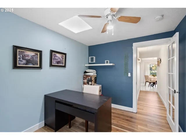 a workspace with furniture and window