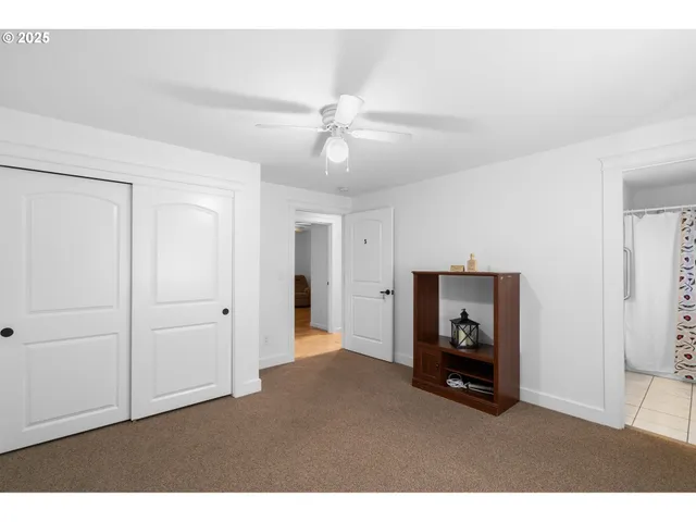 a living room with furniture and a tv