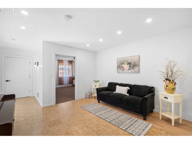 a living room with furniture and a couch