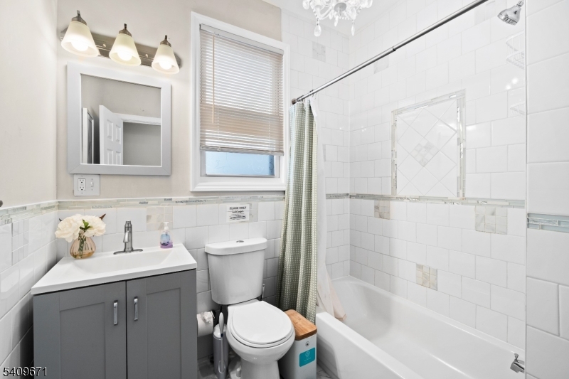 33 Mapes Avenue, Unit 2 Newark, NJ 07112 - Photo 25 of 40 a bathroom with a sink toilet and shower