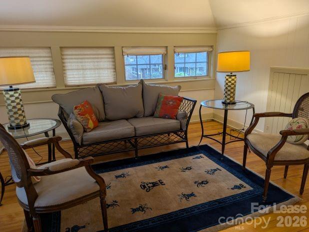 a living room with furniture and window