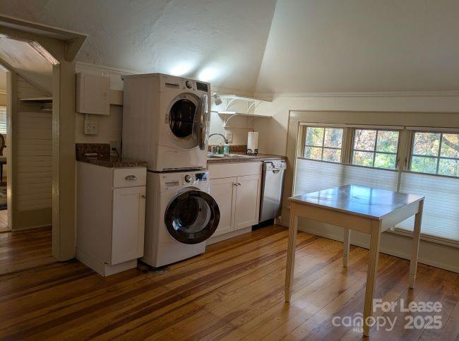 220 Melrose Circle, Unit 2 Tryon, NC 28782 - Photo 6 of 9 a view of a hallway with washer and dryer