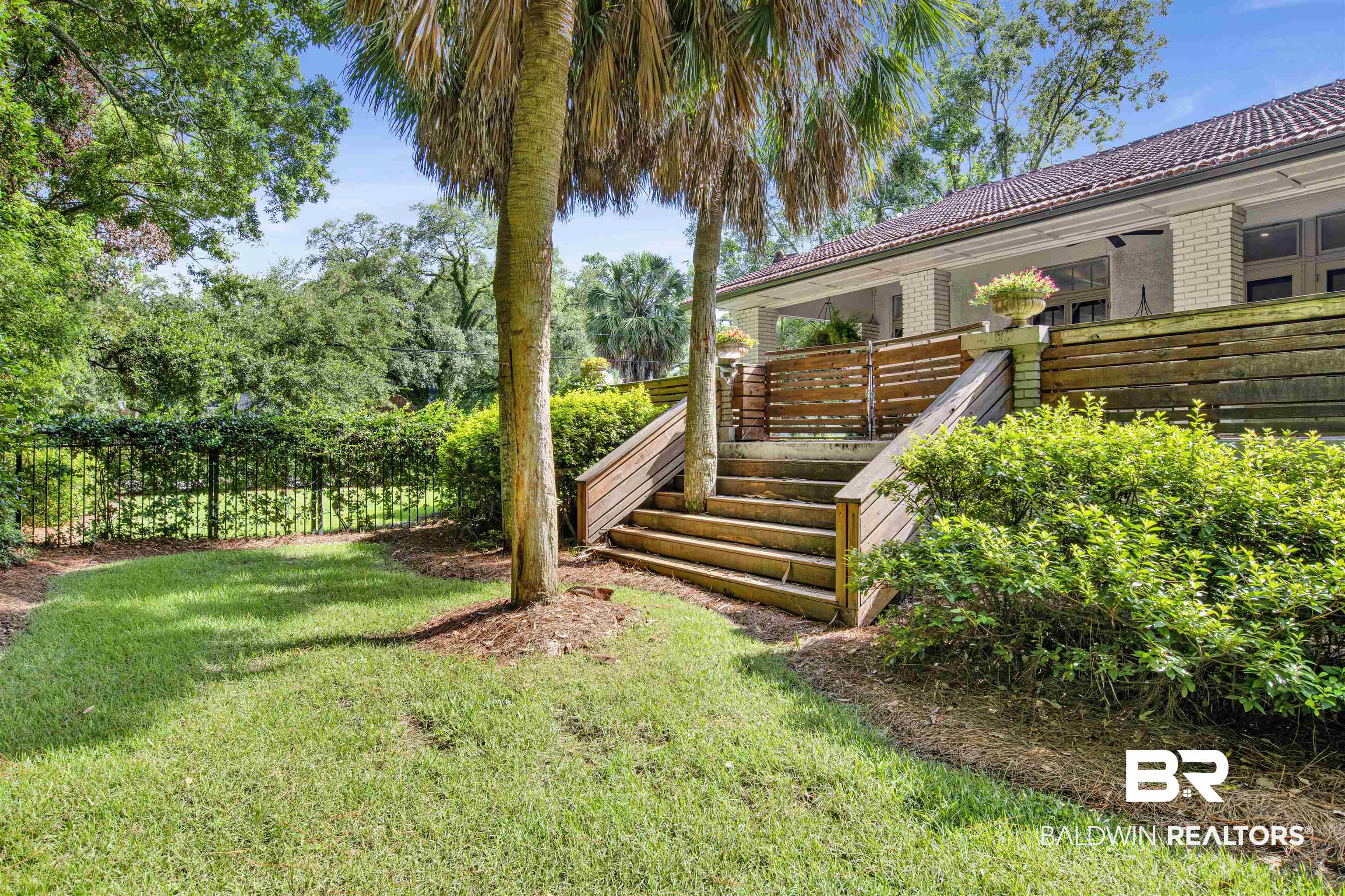 1654 Government Street Mobile, AL 36604 - Photo 11 of 45 View of yard featuring a deck