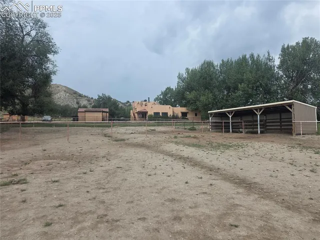 a view of a house with a bed and a closet