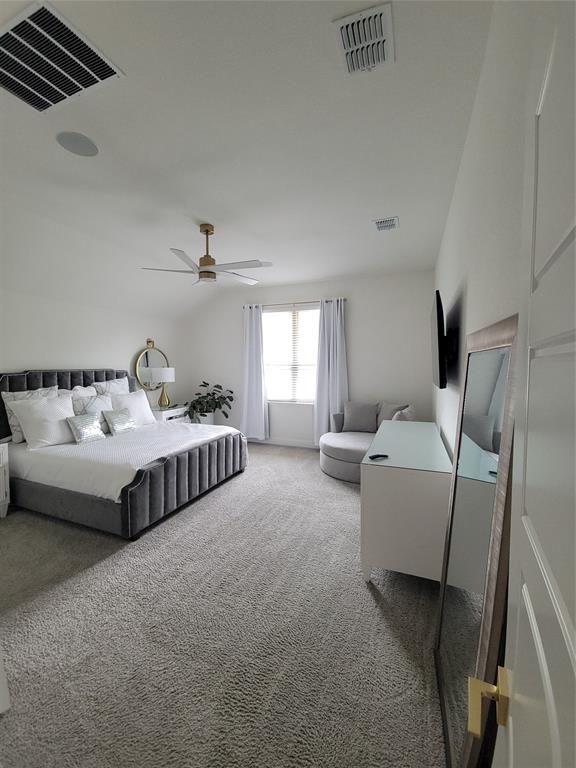7024 Tree Stand Point Little Elm, TX 76227 - Photo 13 of 30 a bedroom with bed and window