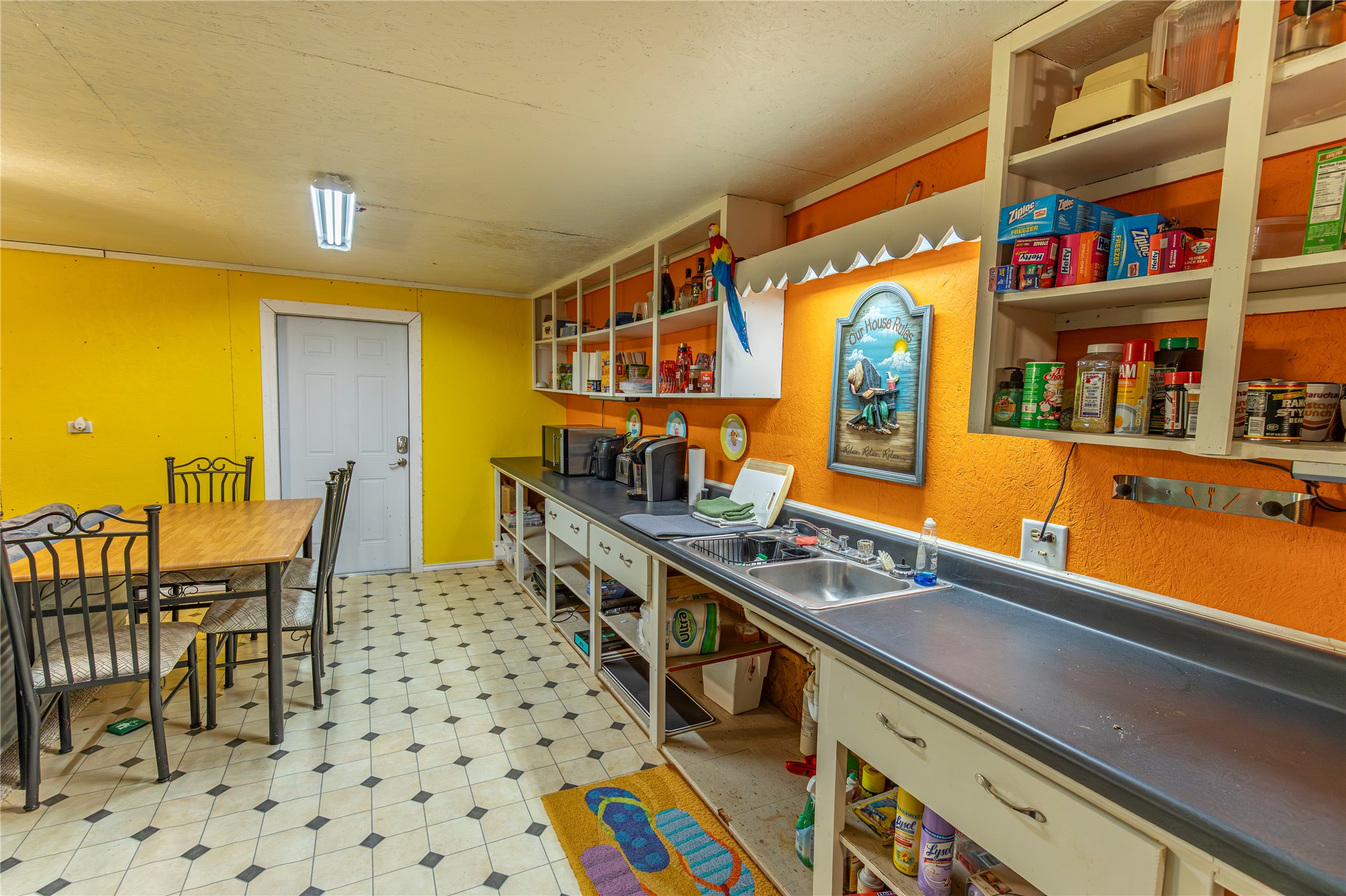 267 South Gulf Road Bay City, TX 77414 - Photo 10 of 26 a kitchen with stainless steel appliances a sink and a refrigerator