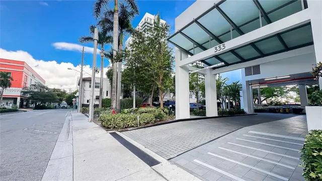 a view of a building with a street