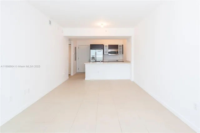 a view of a kitchen with a sink