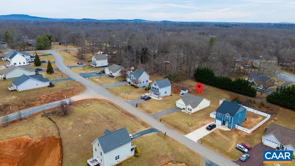 a view of yard from terrace with seating area