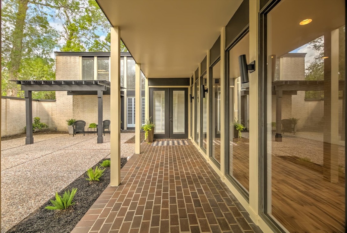 Welcome to your private oasis—enter the elegant gated courtyard.
