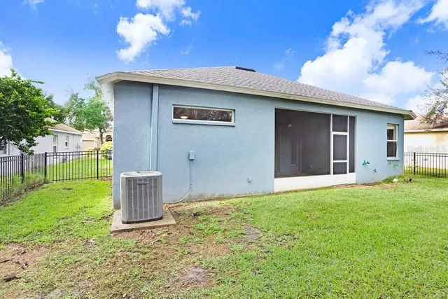 an aerial view of a house with a garden