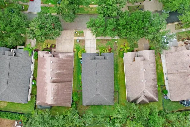 an aerial view of a house with a garden