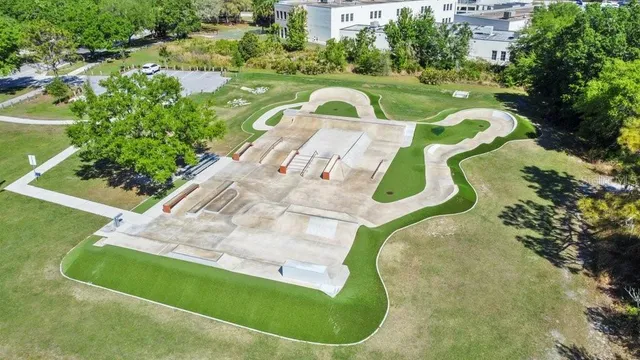 a view of a yard with table and chairs potted plants