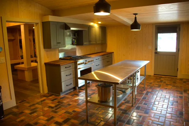 a view of field with tall trees