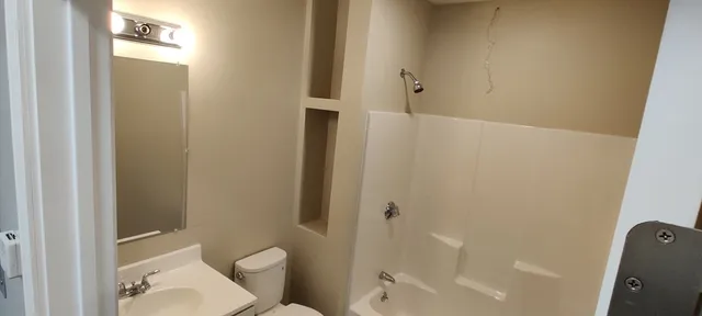 a car parked in front of a building