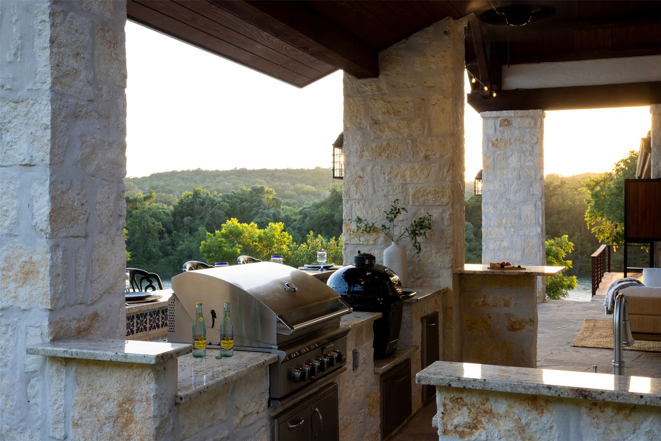 15016 Flat Top Ranch Road Austin, TX 78732 - Photo 12 of 40 View of patio / terrace featuring an outdoor kitchen and a wooded view