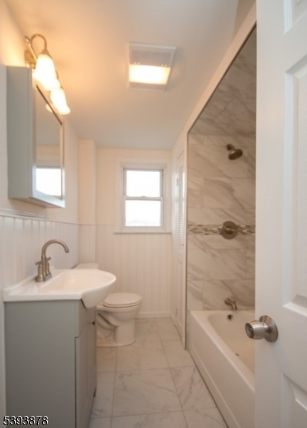7 Berry Road, Unit A Wantage, NJ 07461 - Photo 12 of 18 a bathroom with a sink a toilet and shower