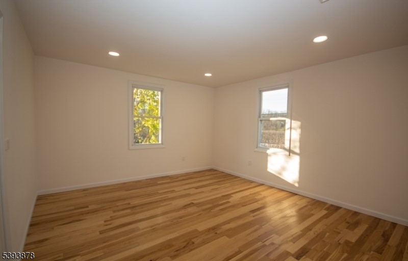 7 Berry Road, Unit A Wantage, NJ 07461 - Photo 14 of 18 wooden floor in an empty room with a window