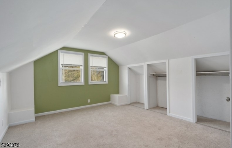 7 Berry Road, Unit A Wantage, NJ 07461 - Photo 18 of 18 an empty room with windows and closet