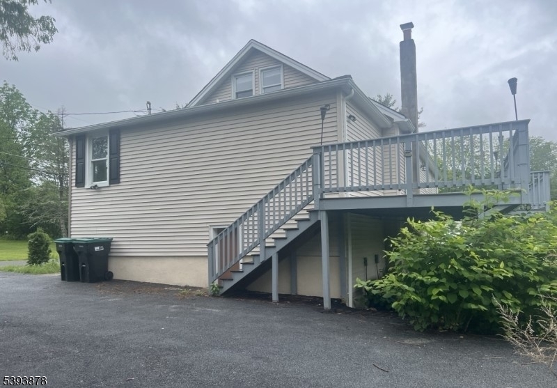 7 Berry Road, Unit A Wantage, NJ 07461 - Photo 3 of 18 a view of a house with a small yard and plants