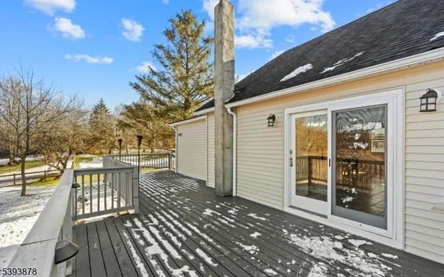 a balcony with wooden floor