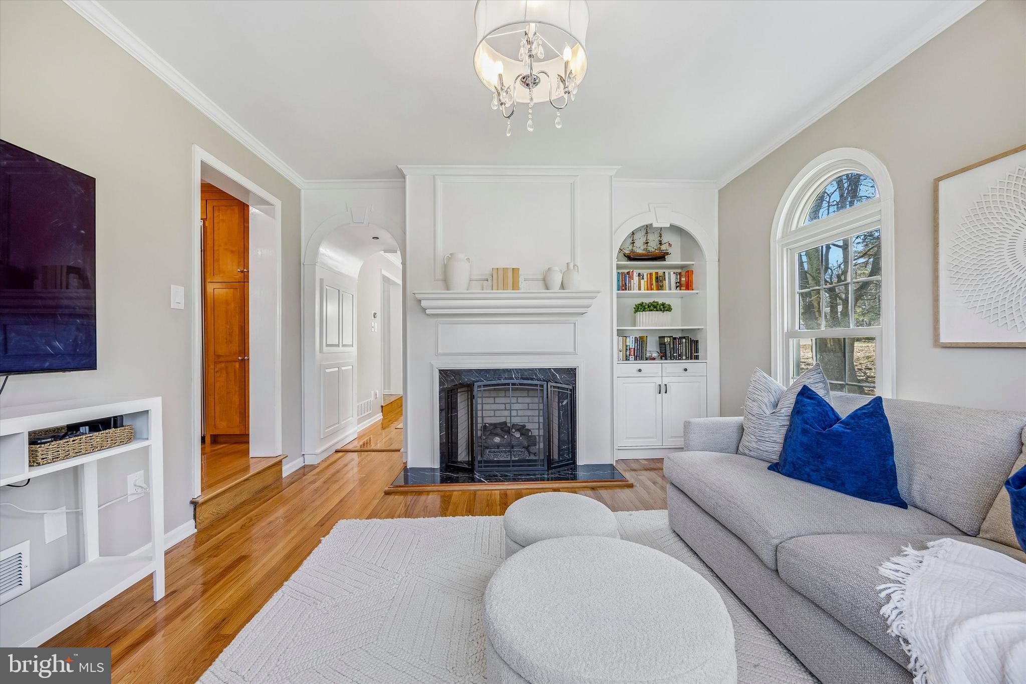 872 Roscommon Road Bryn Mawr, PA 19010 - Photo 11 of 49 a living room with furniture and a fireplace