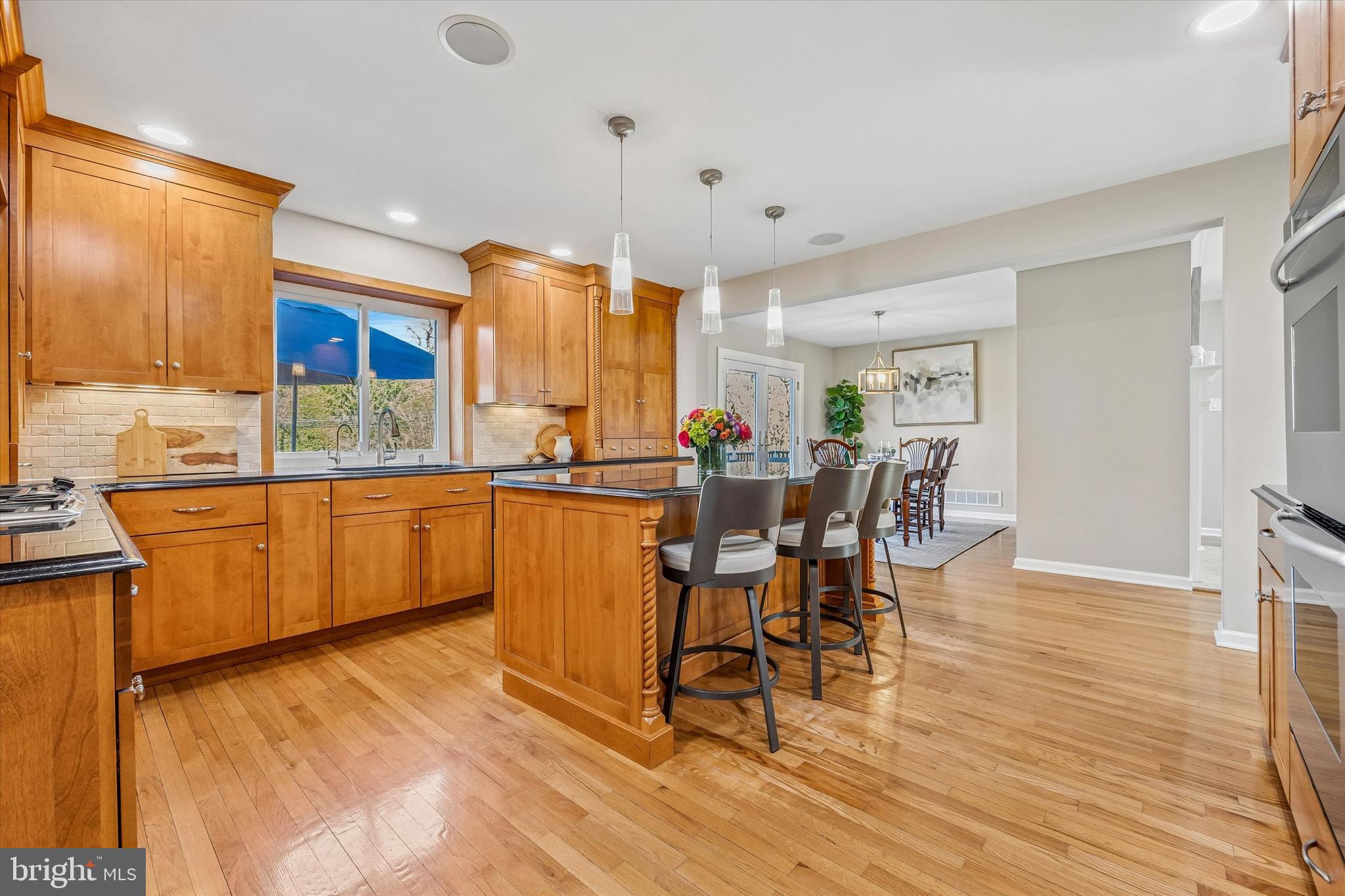 872 Roscommon Road Bryn Mawr, PA 19010 - Photo 12 of 49 a kitchen with a sink cabinets and wooden floor