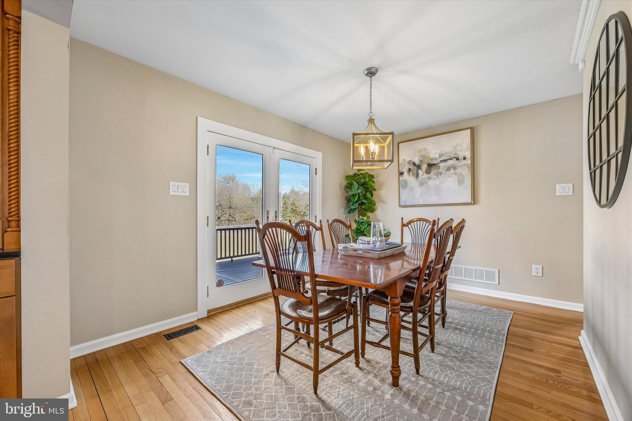 872 Roscommon Road Bryn Mawr, PA 19010 - Photo 15 of 49 a view of a dining room with furniture window and wooden floor