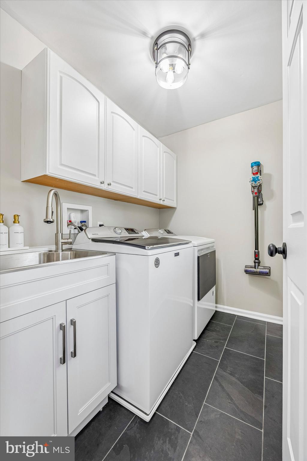 872 Roscommon Road Bryn Mawr, PA 19010 - Photo 19 of 49 a kitchen with cabinets and window