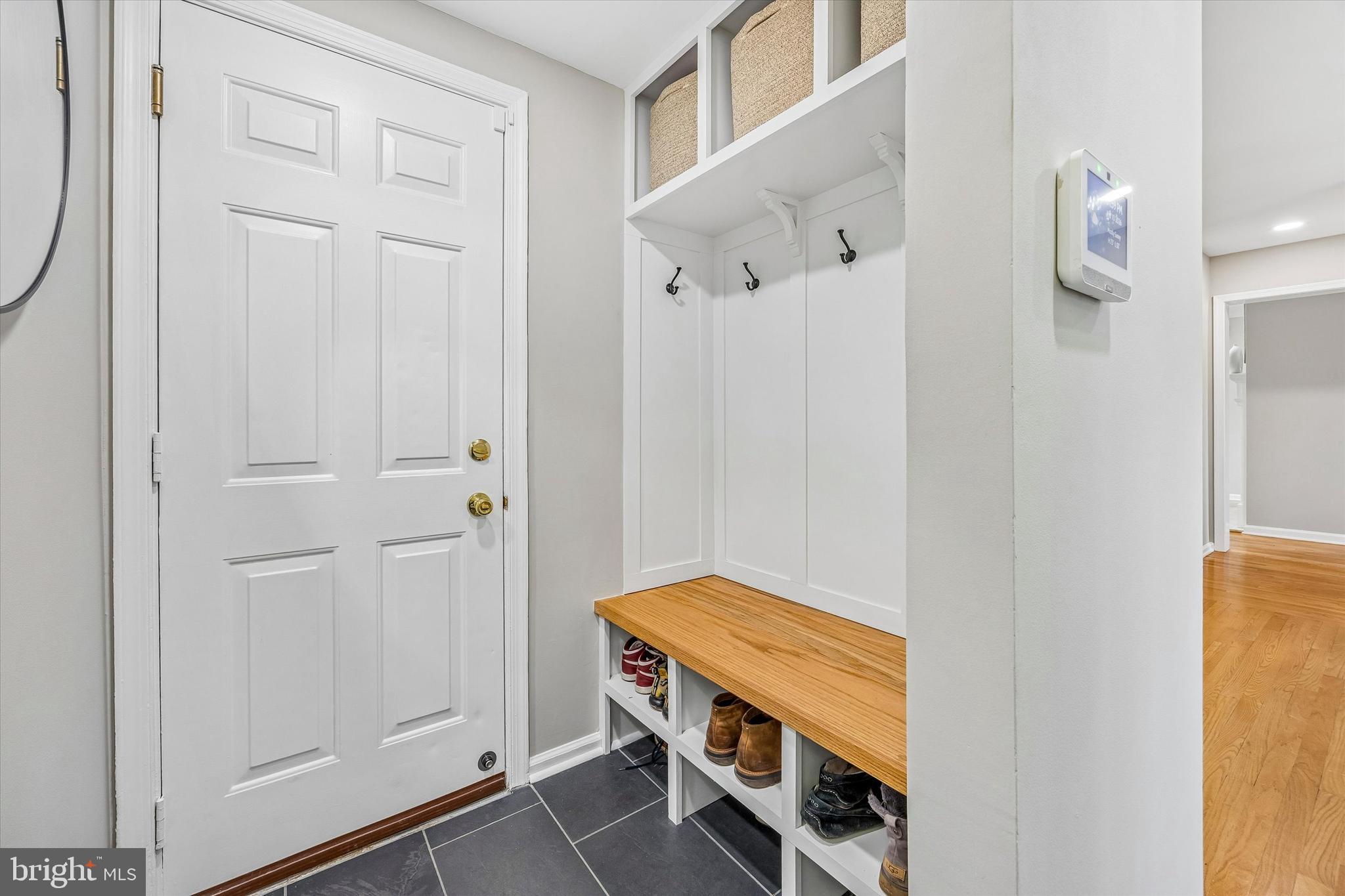 872 Roscommon Road Bryn Mawr, PA 19010 - Photo 20 of 49 a room with a table and dryer