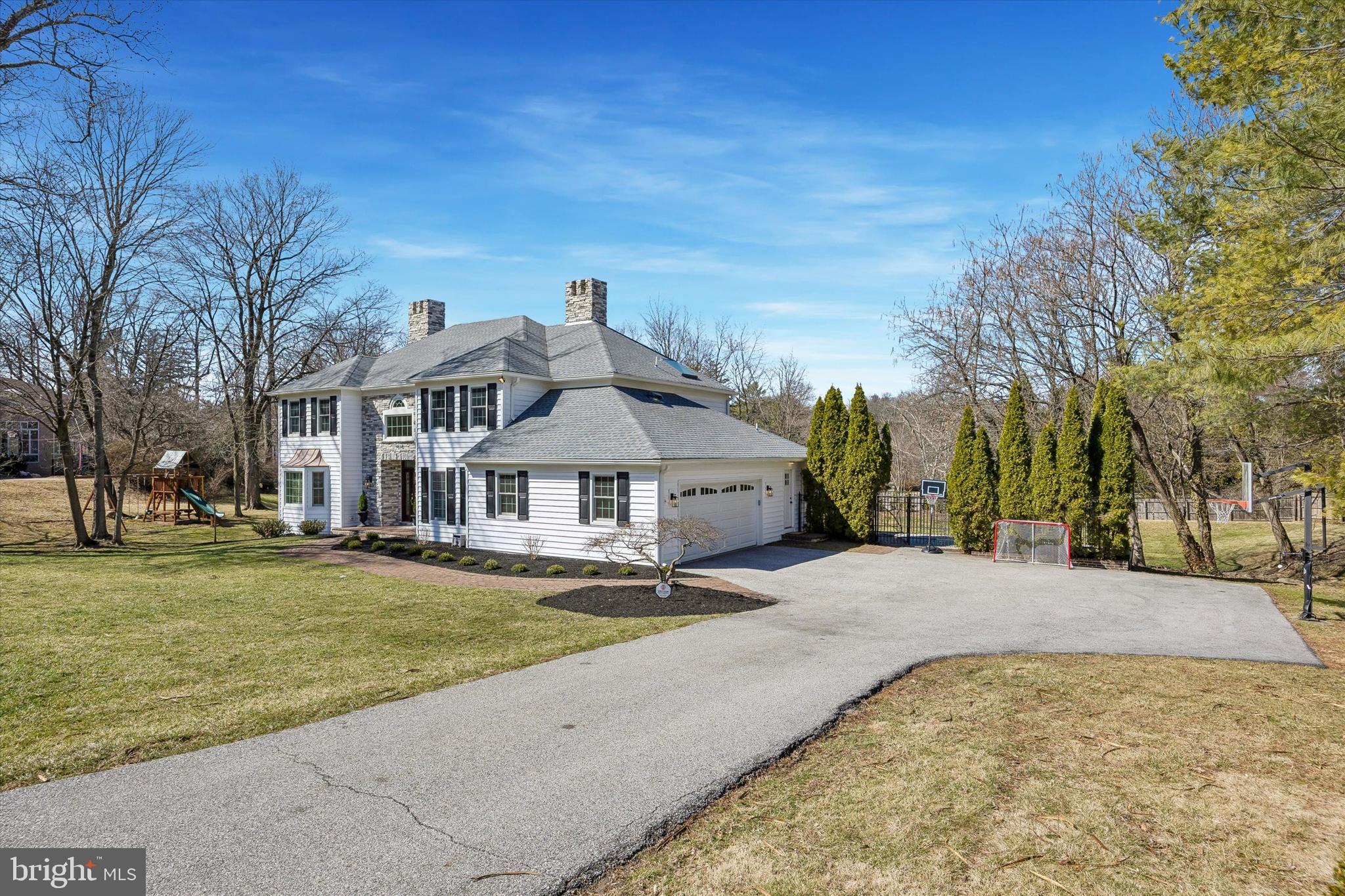 872 Roscommon Road Bryn Mawr, PA 19010 - Photo 2 of 49 a front view of a house with a yard