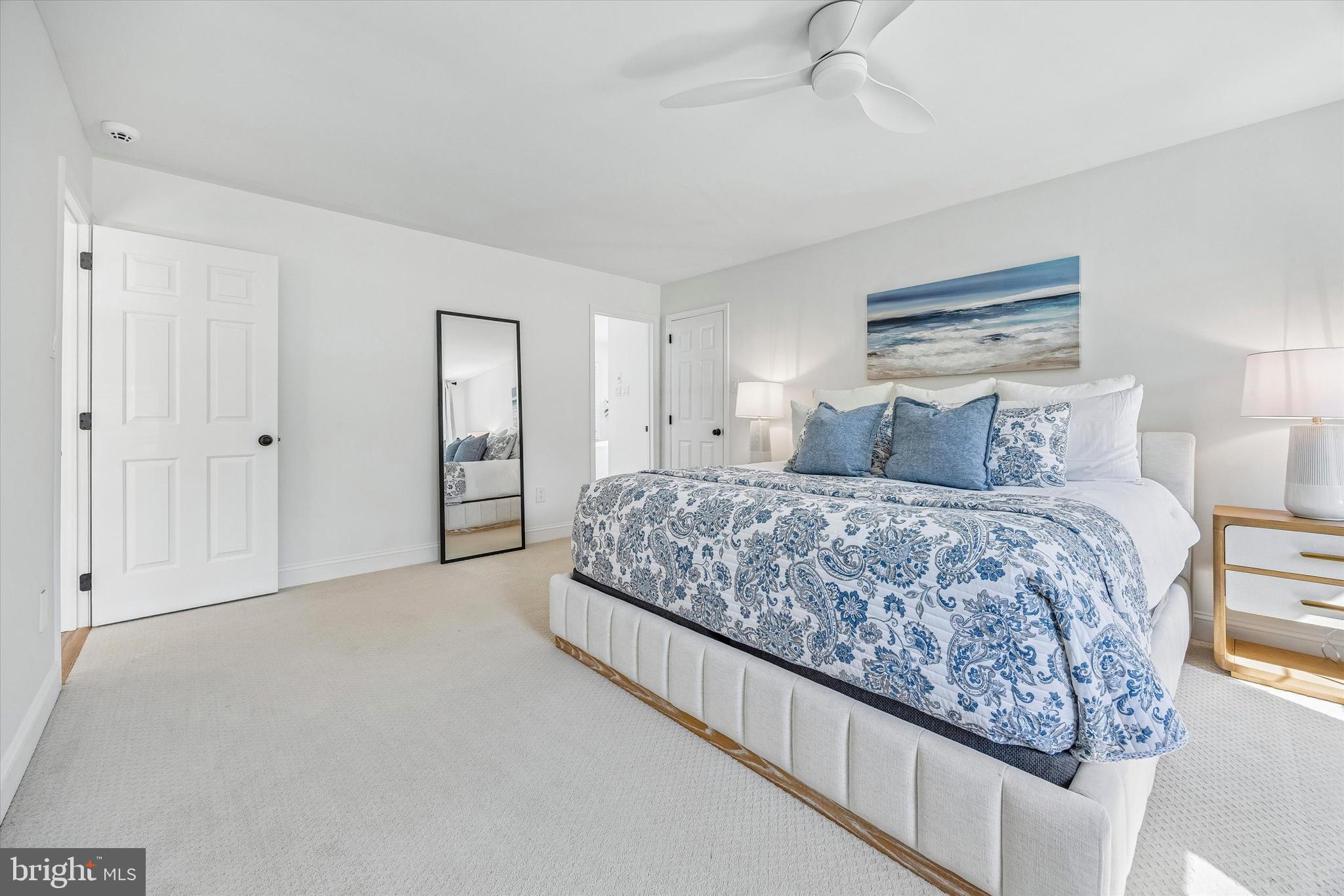 872 Roscommon Road Bryn Mawr, PA 19010 - Photo 23 of 49 a bedroom with a large bed and dresser