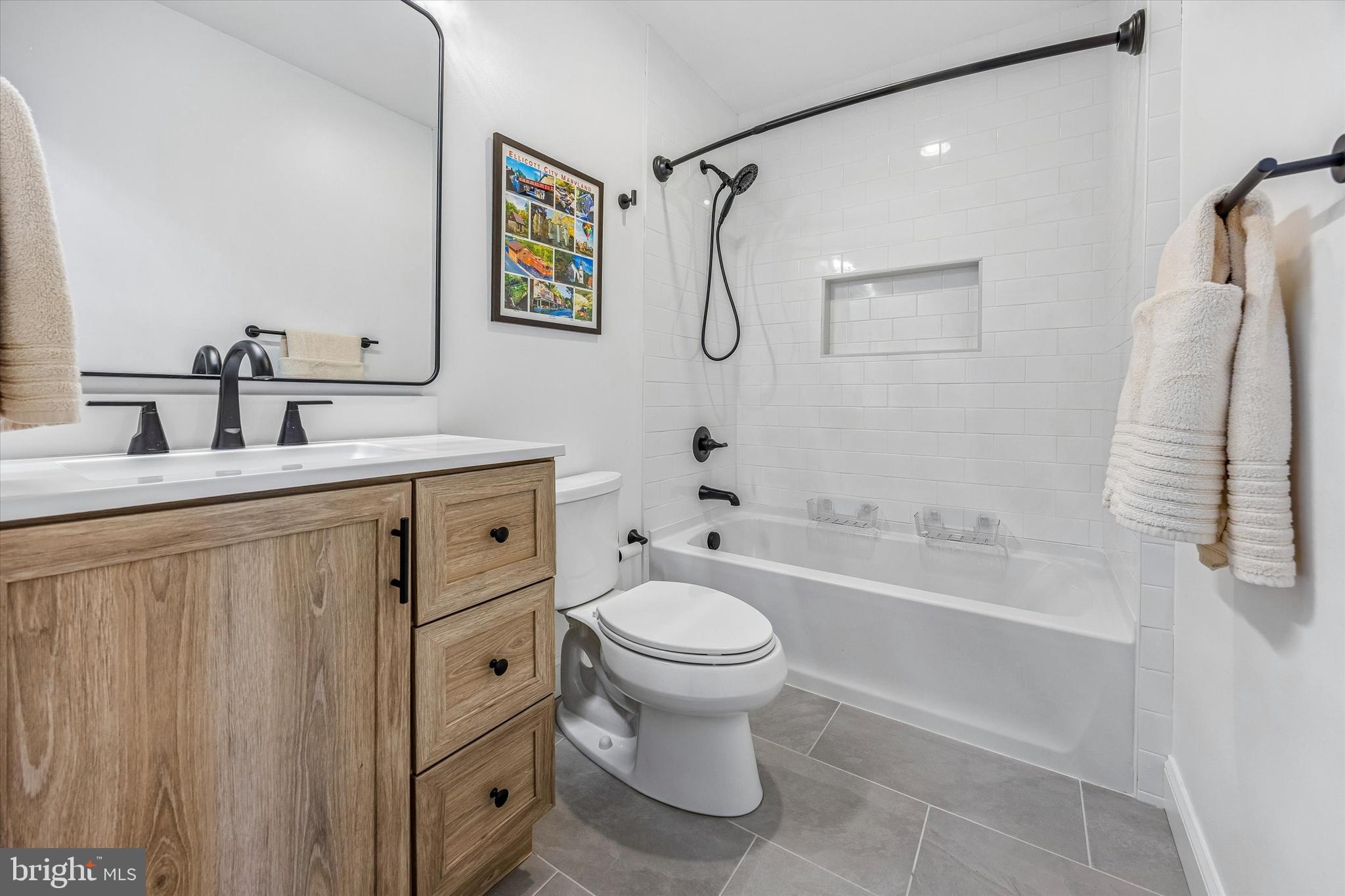 872 Roscommon Road Bryn Mawr, PA 19010 - Photo 29 of 49 a bathroom with a double vanity sink toilet and shower