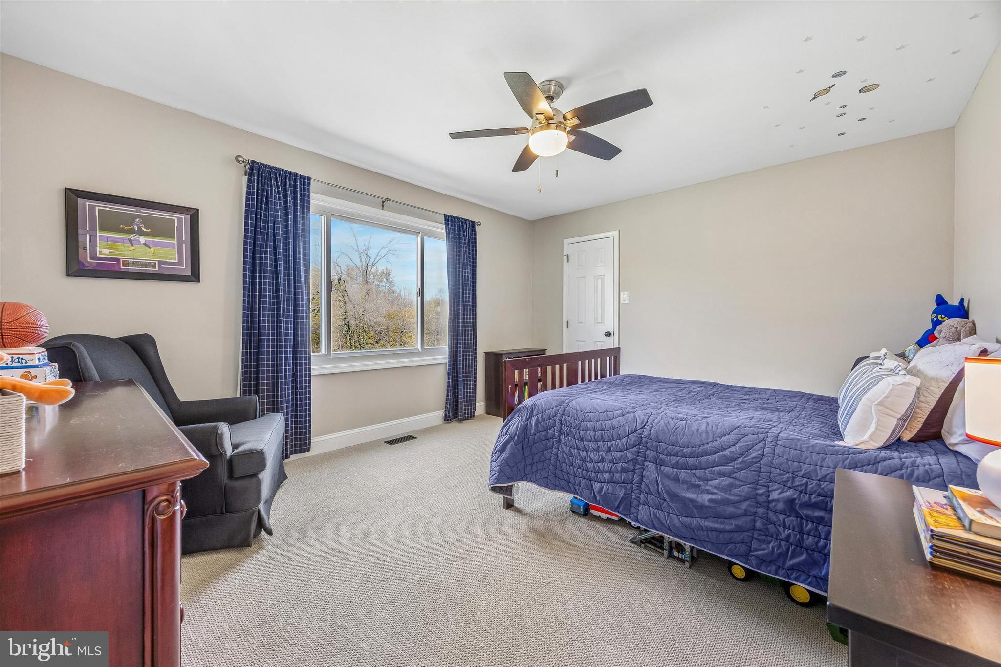 872 Roscommon Road Bryn Mawr, PA 19010 - Photo 33 of 49 a bedroom with a bed and a window