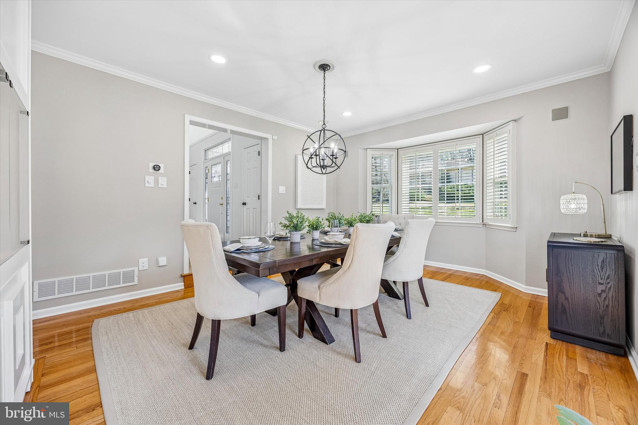 872 Roscommon Road Bryn Mawr, PA 19010 - Photo 6 of 49 a view of a dining room with furniture window and wooden floor