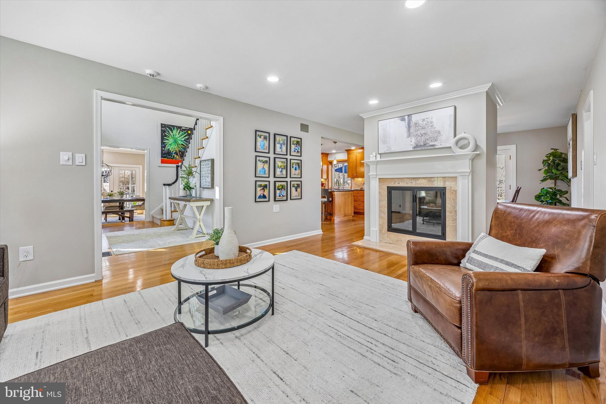 872 Roscommon Road Bryn Mawr, PA 19010 - Photo 9 of 49 a living room with furniture and a fireplace