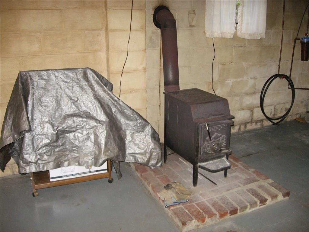 722 Leighty Hollow Road Ruffs Dale, PA 15679 - Photo 15 of 18 Wood burner for extra heat.