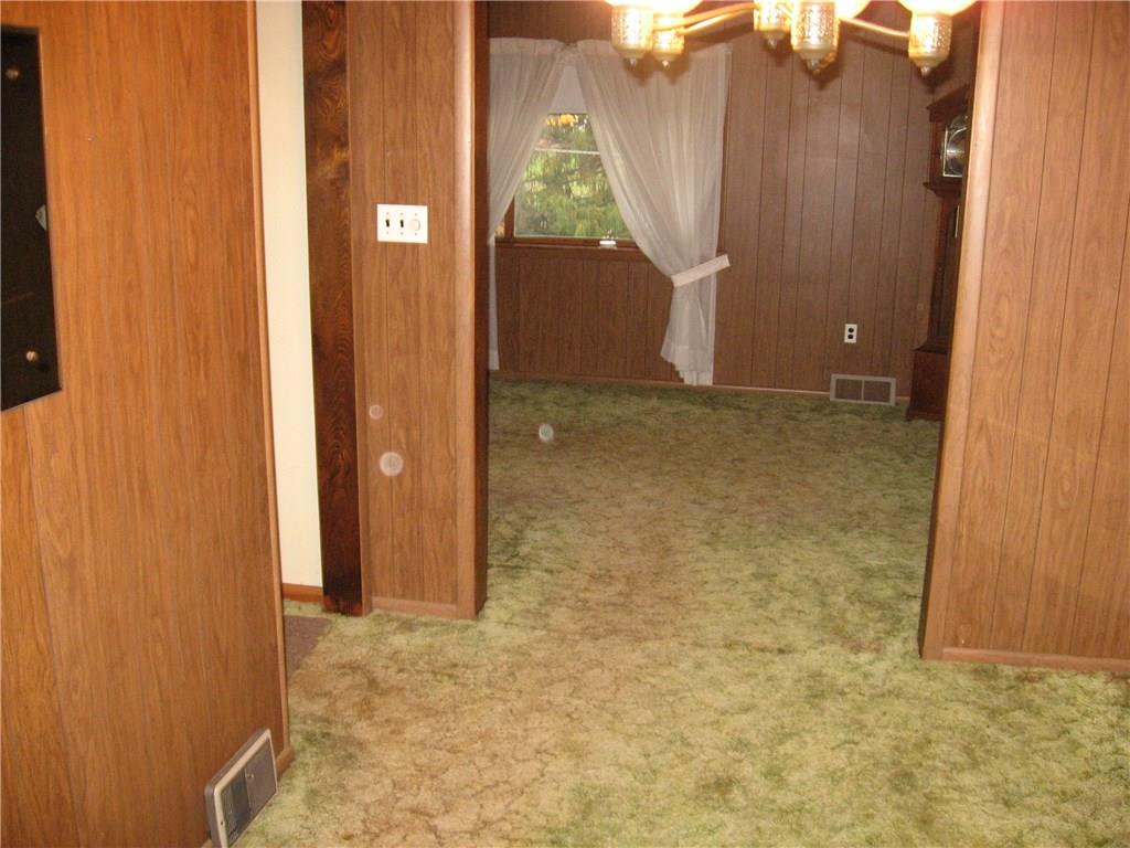 722 Leighty Hollow Road Ruffs Dale, PA 15679 - Photo 6 of 18 Paneled walls throughout the home, carpeting, and dining area is 7 x 11