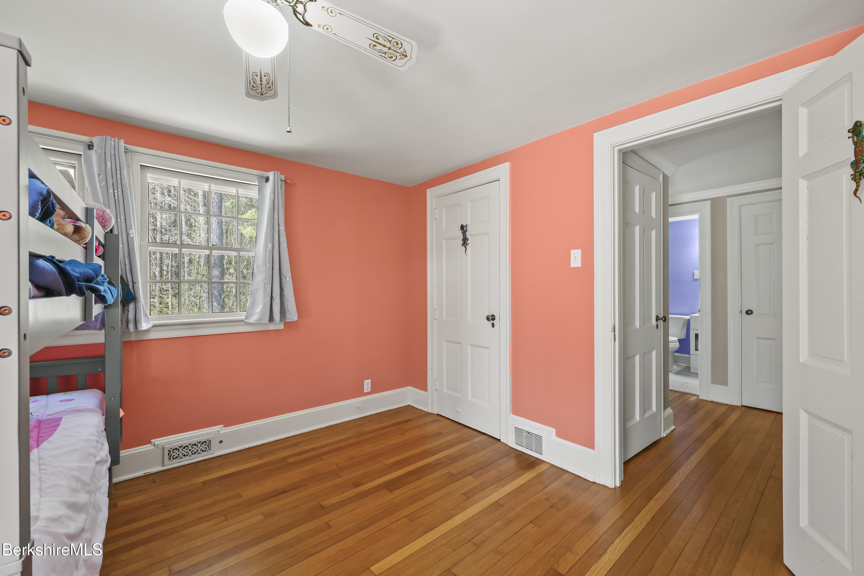 100 South Prospect Street Lee, MA 01238 - Photo 19 of 39 a view of an empty room with wooden floor and a window