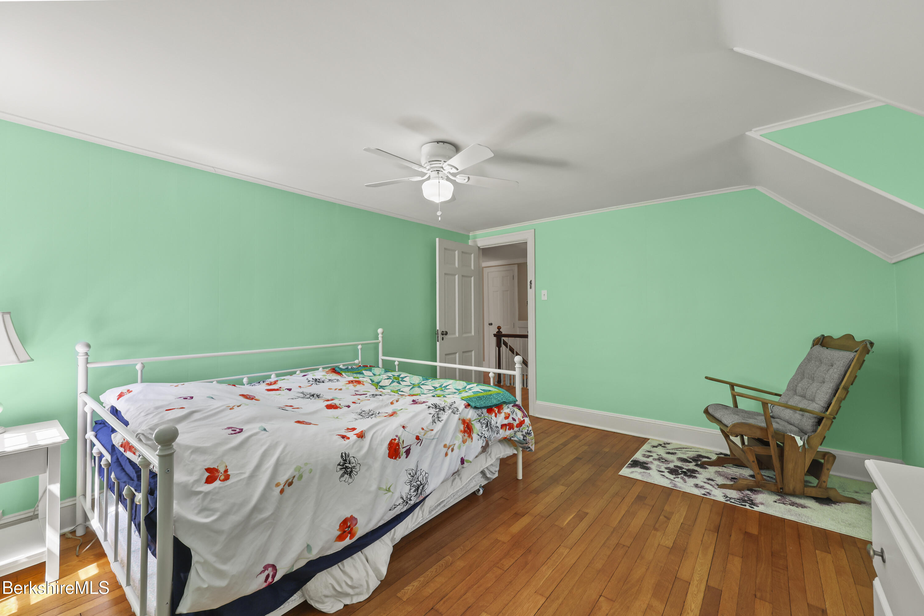 100 South Prospect Street Lee, MA 01238 - Photo 21 of 39 a bedroom with a bed and a table