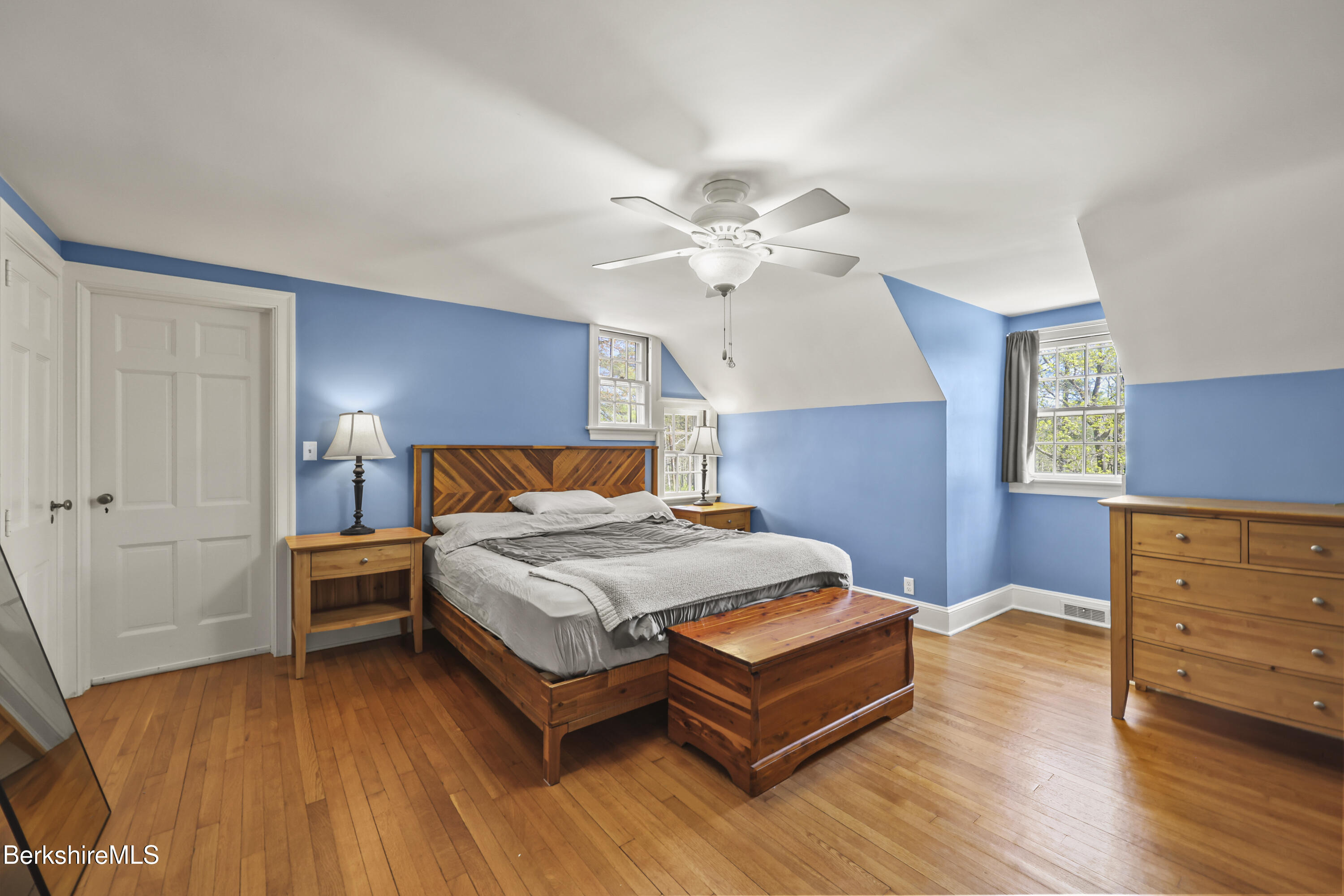 100 South Prospect Street Lee, MA 01238 - Photo 23 of 39 a bedroom with a bed and wooden floor