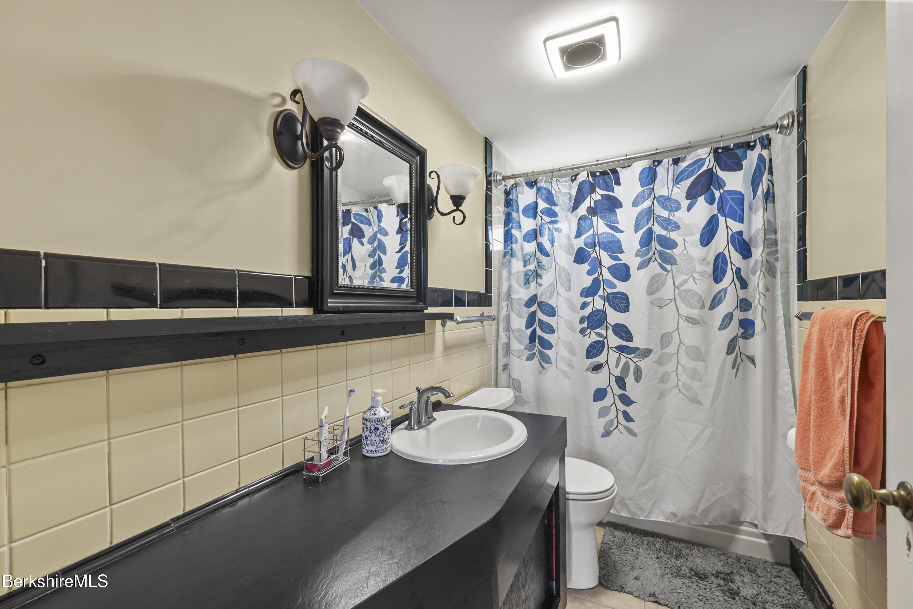 100 South Prospect Street Lee, MA 01238 - Photo 25 of 39 a bathroom with a sink and a mirror
