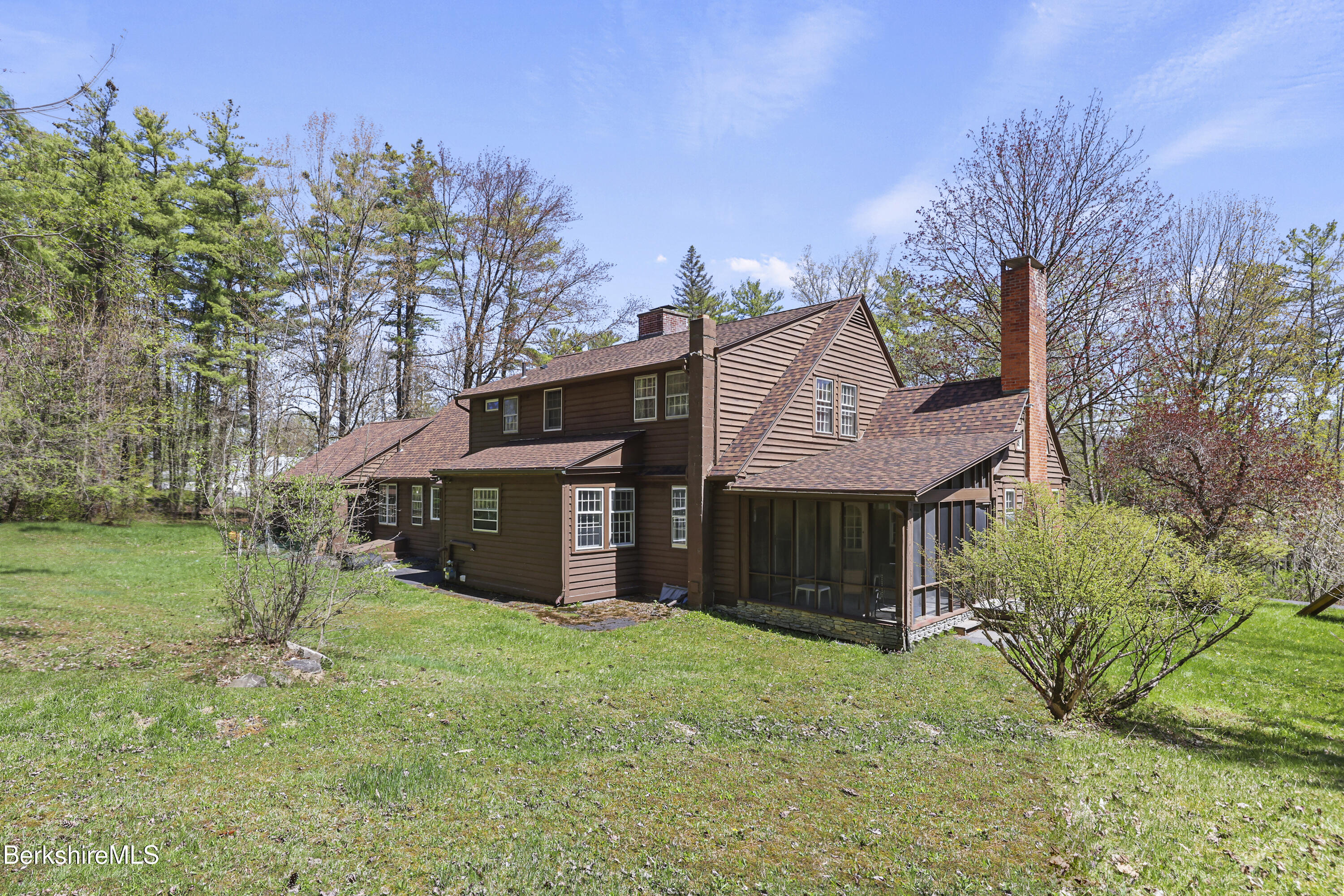 100 South Prospect Street Lee, MA 01238 - Photo 35 of 39 a view of a big house with a big yard and large tree